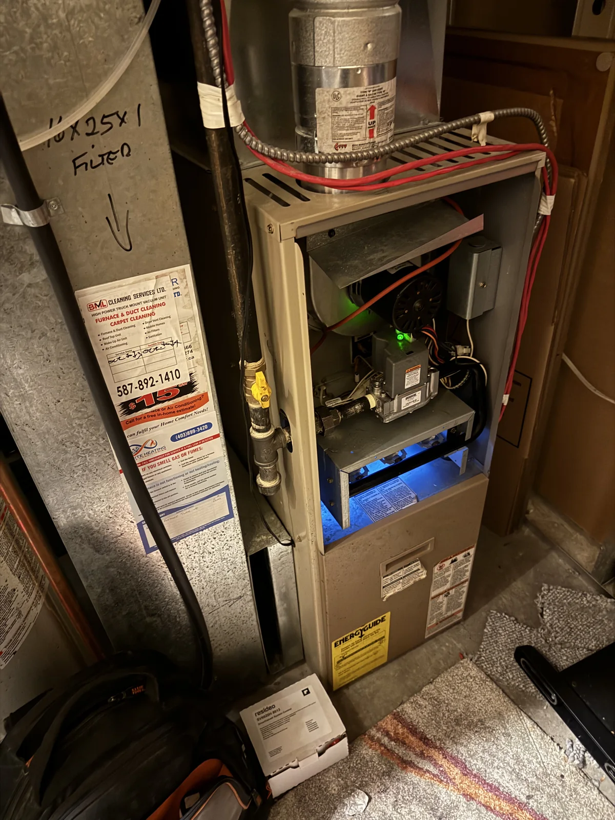 Furnace cabinet opened for professional diagnosis and repair